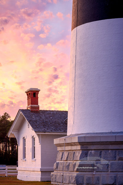 The keeper's quarters at the base of Bodie Island Lighthouse is dwarf next to the size of the lighthouse, on this beautifully cloudy sunset. This little house originally served as the residence for the light keeper at and their family, who were responsible for maintaining the lighthouse and it's light before automation.