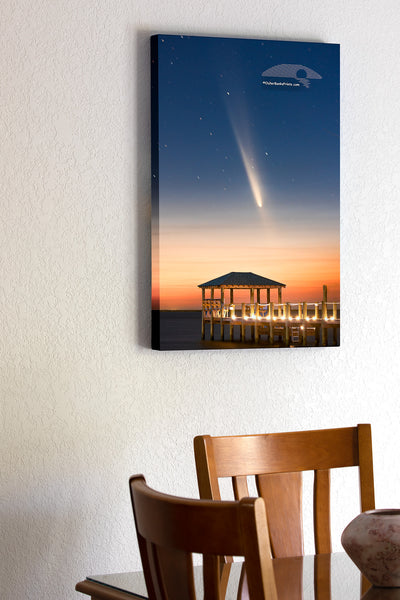 The comet known as C/2023 A3 Tsuchinshan-ATLAS, shines over Kitty Hawk Bay at twilight, captured from Kill Devil Hills beach boat ramp. The gazebo and dock in the foreground add a peaceful touch to this Outer Banks view.