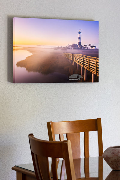 Captured from the observation platform just before sunrise, this photo of Bodie Island Lighthouse shows mist and fog settling over the marsh, adding a quiet sense of mystery.