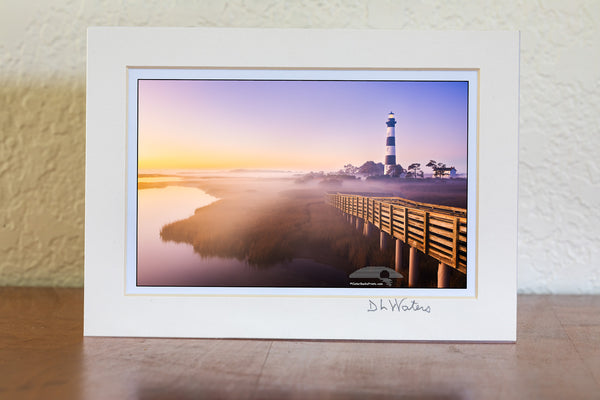 Captured from the observation platform just before sunrise, this photo of Bodie Island Lighthouse shows mist and fog settling over the marsh, adding a quiet sense of mystery.