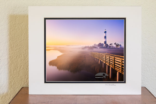 Captured from the observation platform just before sunrise, this photo of Bodie Island Lighthouse shows mist and fog settling over the marsh, adding a quiet sense of mystery.