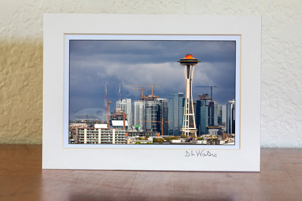 Seattle space needle stands out from the construction of Seattle's skyline.