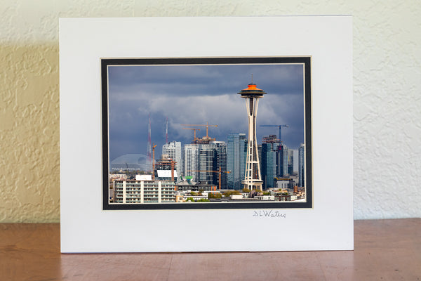 Seattle space needle stands out from the construction of Seattle's skyline.