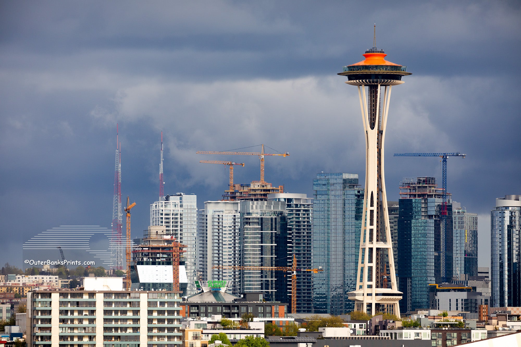 Seattle space needle stands out from the construction of Seattle's skyline.