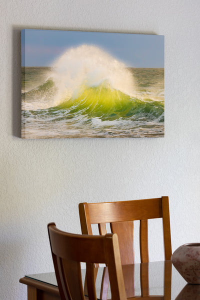 Late afternoon surf collides at Cape Point, revealing the vibrant green hues of the water in Cape Hatteras National Seashore on the Outer Banks of North Carolina.