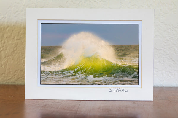 Late afternoon surf collides at Cape Point, revealing the vibrant green hues of the water in Cape Hatteras National Seashore on the Outer Banks of North Carolina.