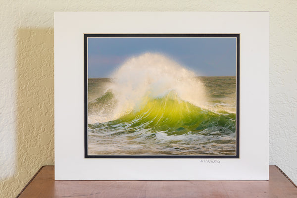 Late afternoon surf collides at Cape Point, revealing the vibrant green hues of the water in Cape Hatteras National Seashore on the Outer Banks of North Carolina.