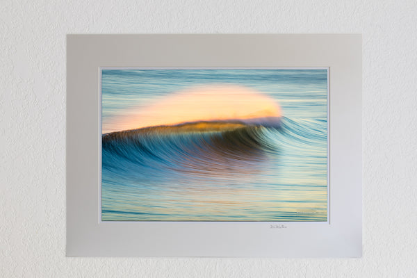 13x19 Luster Print in a 18x24 ivory mat Sunrise windblown surf spray at Kitty Hawk Pier photographed with a long telephoto lens and a slow shutter speed.