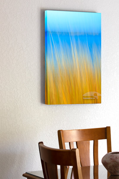 20"x30" x1.5" stretched canvas print hanging in the dining room of Pamlico Sound grass photographed with a long exposure while the camera was moved.