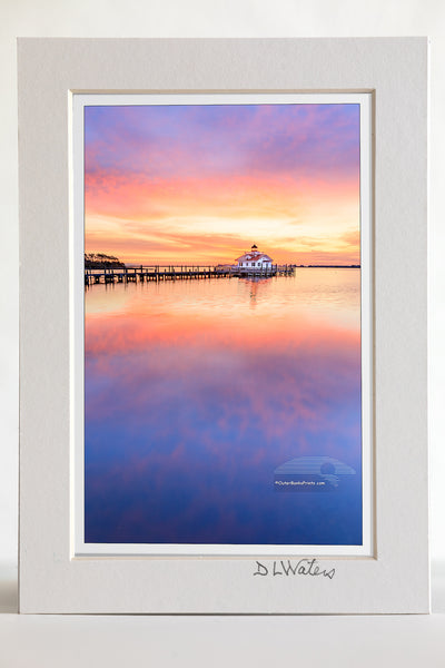 4 x 6 luster print in a 5 x 7 ivory mat of Manteno lighthouse and waterfron sunrise Roanoke Island on the Outer Banks of NC.