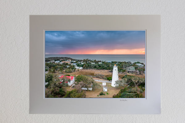 13 x 19 luster print in 18 x 24 ivory ￼￼mat of Storm at sunset above Ocracoke Lighthouse on the Outer Banks, NC.