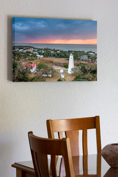 20"x30" x1.5" stretched canvas print hanging in the dining room of Storm at sunset above Ocracoke Lighthouse on the Outer Banks, NC.