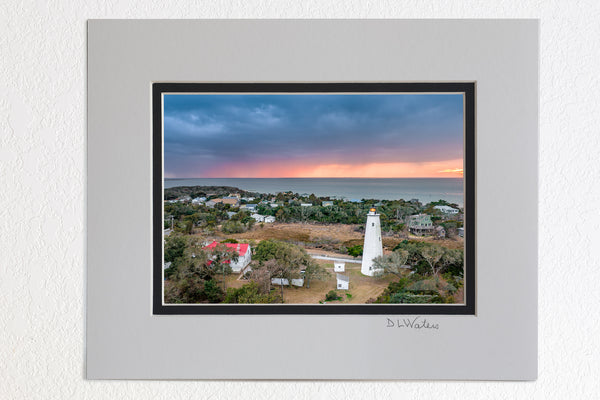 5 x 7 luster prints in a 8 x 10 ivory and black double mat of Storm at sunset above Ocracoke Lighthouse on the Outer Banks, NC.