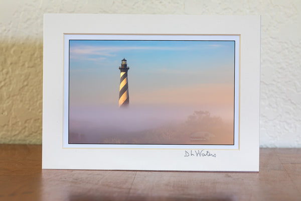 Cape Hatteras Lighthouse in the clear above the fog at Buxton, NC in Cape Hatteras National Seashore.