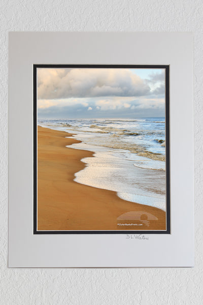 8 x 10 luster print in a 11 x 14 ivory and black double mat of Nags Head beach at sunrise on the Outer Banks.