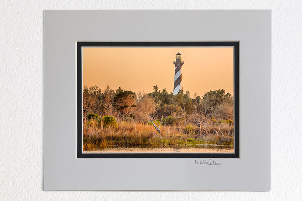 5 x 7 luster prints in a 8 x 10 ivory and black double mat of  Cape Hatteras Lighthouse and reflection on Hatteras Island. This iconic spiral lighthouse is still in use today.