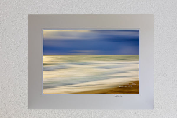 13x19 Luster Print in a 18x24 ivory mat of Long sunrise exposure while moving the camera of a Outer Banks beach.