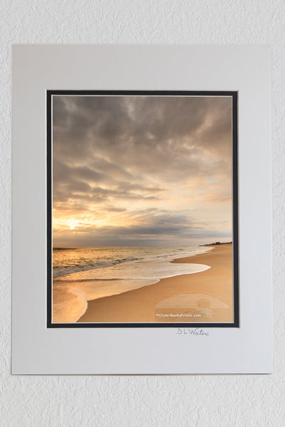 8 x 10 luster print in a 11 x 14 ivory and black double mat of Stormy sky at Kitty Hawk beach on the Outer Banks.