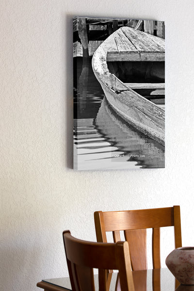 20"x30" x1.5" stretched canvas print hanging in the dining room of Old boat and dock at hog quarter along Currituck sound. Photographed in black and white.