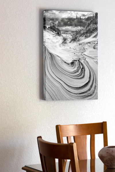20"x30" x1.5" stretched canvas print hanging in the dining room of Black and white sand dune and sky in Corolla on the Outer Banks of North Carolina.