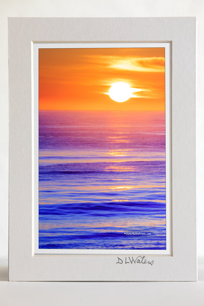 4 x 6 luster print in a 5 x 7 ivory mat of Sunrise over the Atlantic Ocean in Kitty Hawk North Carolina.