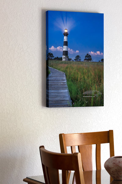 20"x30" x1.5" stretched canvas print hanging in the dining room of Captured from the boardwalk in the marsh behind Bodie Island Lighthouse just after twilight.