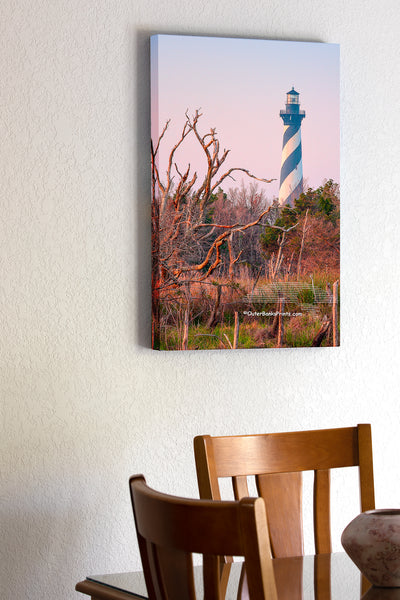 20"x30" x1.5" stretched canvas print hanging in the dining room of Unusual marshy view of Cape Hatteras lighthouse and trees.