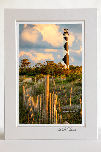 4 x 6 luster print in a 5 x 7 ivory mat of  Sand fence and clouds at Cape Lookout Lighthouse on the Outer Banks of NC.