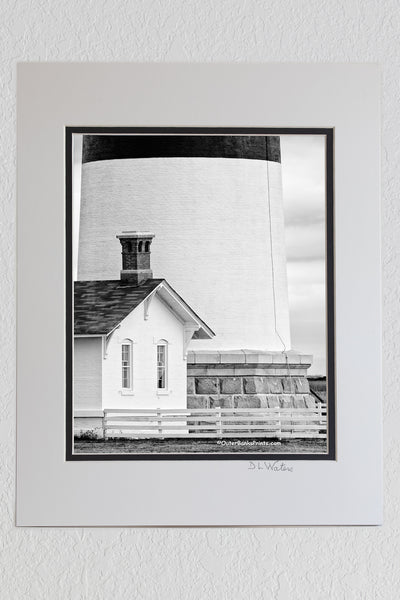 8 x 10 luster print in a 11 x 14 ivory and black double mat of Bodie Island Lighthouse and small light keepers cottage in black and white on the Outer Banks of NC.