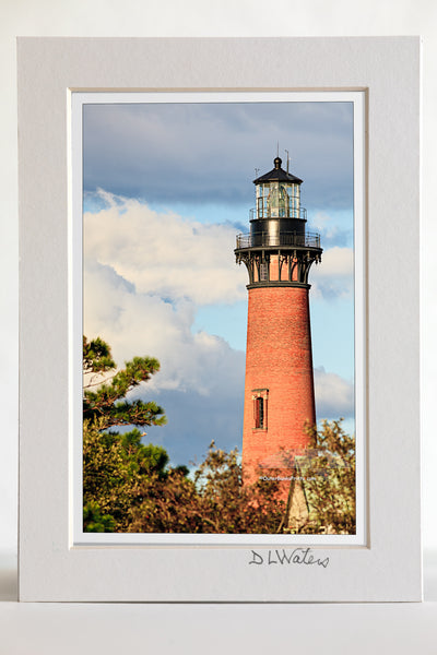4 x 6 luster print in a 5 x 7 ivory mat of A beautiful afternoon that the Corolla NC lighthouse on the Outer Banks.