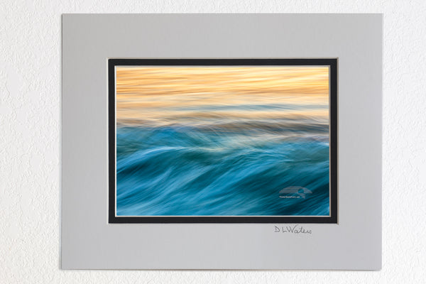 5 x 7 luster prints in a 8 x 10 ivory and black double mat of  Like musical notes moving across the sea, this photograph of the surf was captured with a long exposure at sunrise on the Outer Banks of NC.  