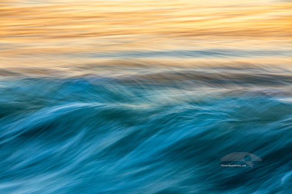 Like musical notes moving across the sea, this photograph of the surf was captured with a long exposure at sunrise on the Outer Banks of NC.