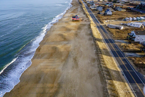 Aerial view of a lonely house on the beach at Kitty Hawk, NC.