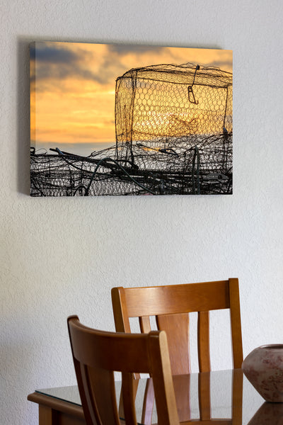 20"x30" x1.5" stretched canvas print hanging in the dining room of Crab traps piled on the dock at sunrise waiting to be set.