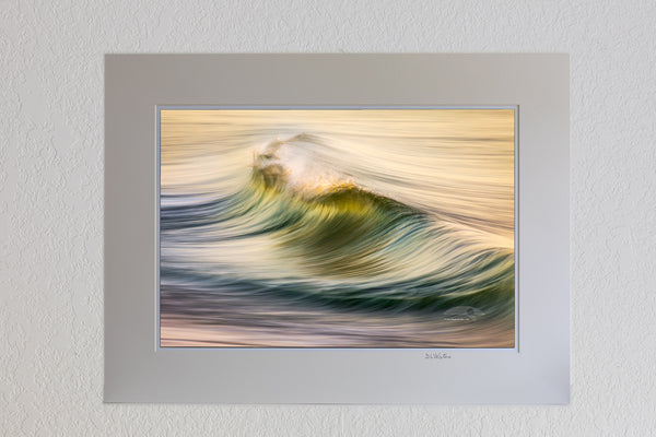 13 x 19 luster print in 18 x 24 ivory ￼￼mat of Motion of the early morning surf on the beach at Kitty Hawk on the Outer Banks of NC.