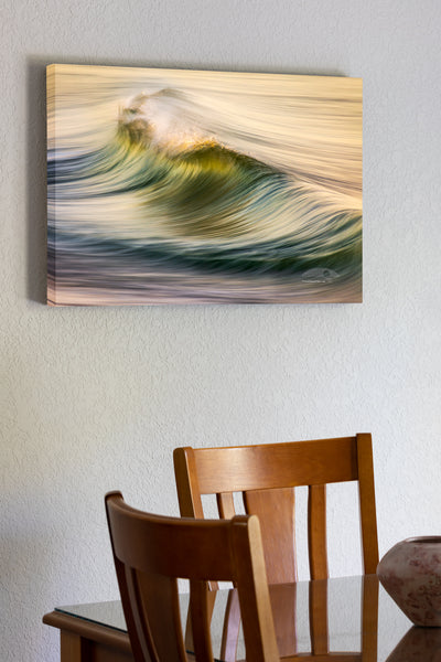 20"x30" x1.5" stretched canvas print hanging in the dining room of Motion of the early morning surf on the beach at Kitty Hawk on the Outer Banks of NC.