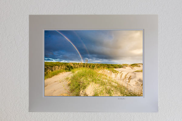 13 x 19 luster print in 18 x 24 ivory ￼￼mat of Outer Bank sand dunes and double rainbow in Corolla North Carolina.