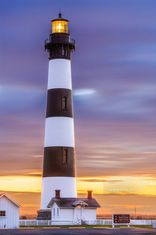 A long exposure of Bodie Island Lighthouse on the Outer Banks, reveals movement in the clouds at sunrise.