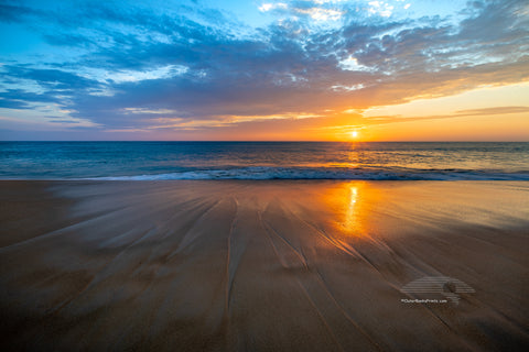 Sunrise sand pattern created by the wave action at Coquina Beach on the Outer Banks, NC.