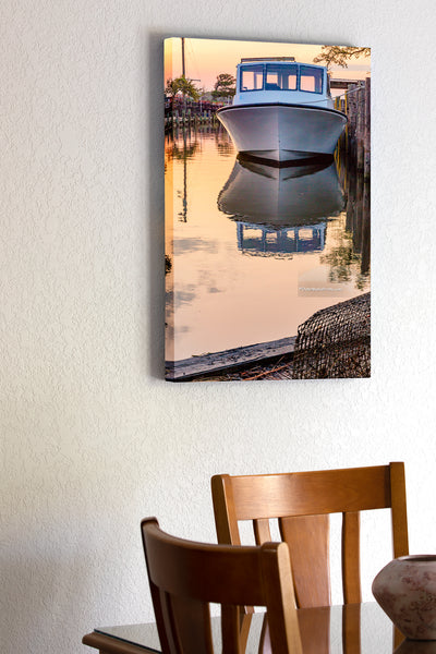 20"x30" x1.5" stretched canvas print hanging in the dining room of Fishing boat tied up next to the dock at sunrise on the Outer Banks of NC.