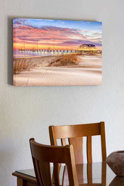 20"x30" x1.5" stretched canvas print hanging in the dining room of Early morning sunrise at Jenette's fishing pier in Nags Head North Carolina.
