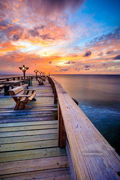 Peaceful sunrise at Kitty Hawk Fishing Pier on the Outer Banks of NC.