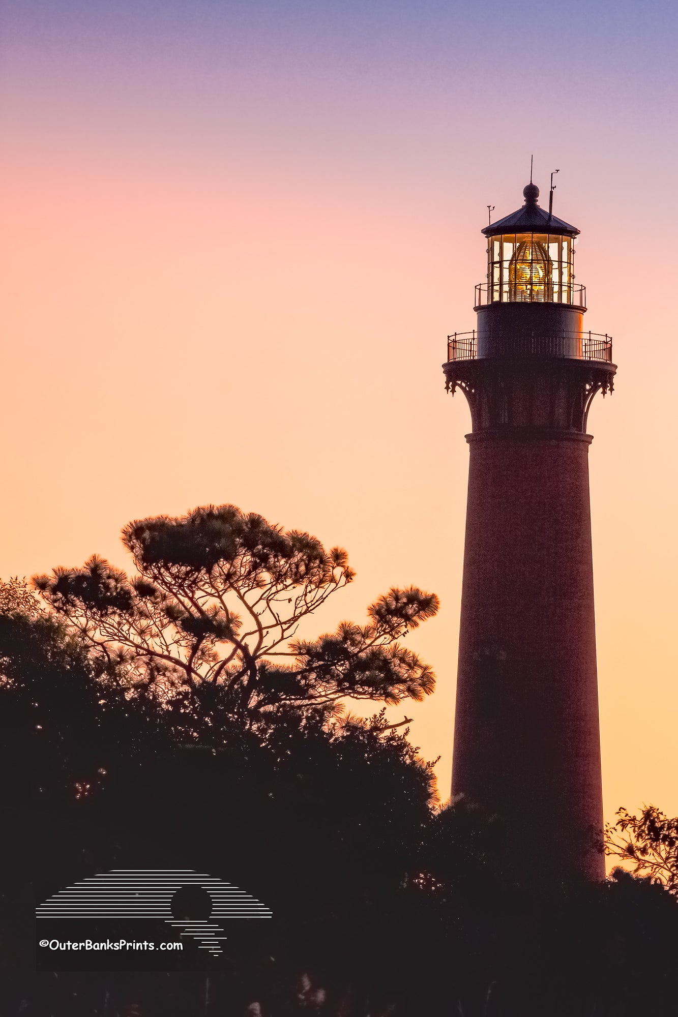 Currituck Beach Lighthouse at dawn in Corolla on the Outer Banks of NC.