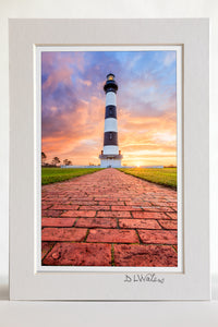4 x 6 luster print in a 5 x 7 ivory mat of A brick path leading to Bodie Island Lighthouse at sunrise on the Outer Banks of North Carolina.