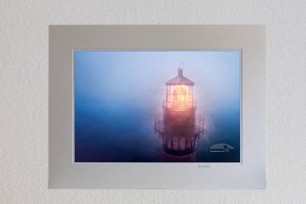 13 x 19 luster print in 18 x 24 ivory ￼￼mat of Aerial view of Currituck Beach Lighthouse in the fog at Corolla on the Outer Banks of NC.