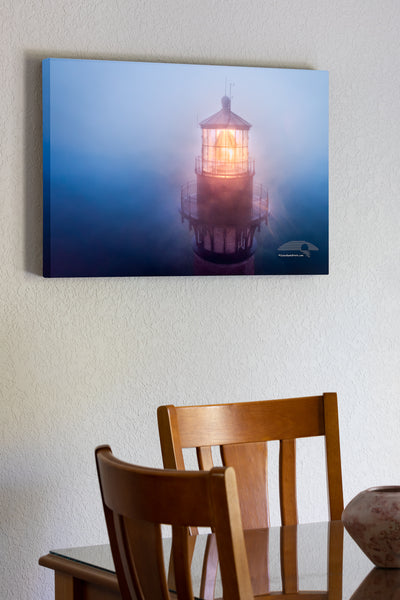 20"x30" x1.5" stretched canvas print hanging in the dining room of Aerial view of Currituck Beach Lighthouse in the fog at Corolla on the Outer Banks of NC.