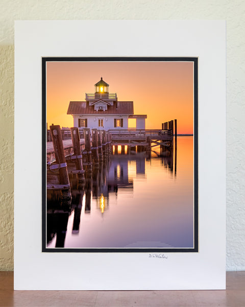 A calm early morning picture of Roanoke Marshes Lighthouse on the Manteo waterfront.