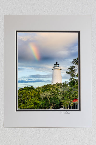 8 x 10 luster print in a 11 x 14 ivory and black double mat of Ocracoke Lighthouse and a rainbow as the morning storm clears.