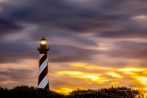 A long exposure well after sunset on a cloud filled evning at Cape Hatteras Lighthouse in Buxton on the Outer Banks of NC. This photograph shows the motion of the clouds while using a long shutter speed.