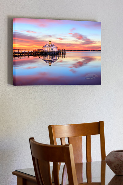 20"x30" x1.5" stretched canvas print hanging in the dining room of Manteno lighthouse and waterfron sunrise Roanoke Island on the Outer Banks of NC.